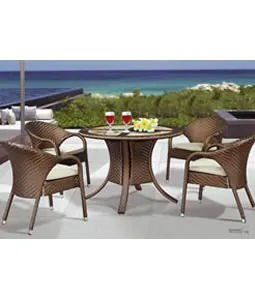 Rattan dining chairs by the beach